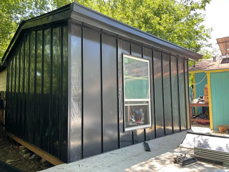 Black standing seam metal wall panels for Metal Roof Installation in Stratford