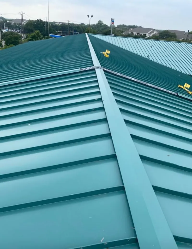 Green commercial metal roof ridge and valley for Metal Roof Repair in Stratford